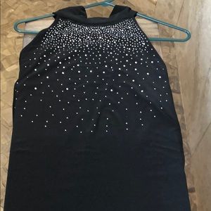 Black turtle neck, rhinestones sleeveless